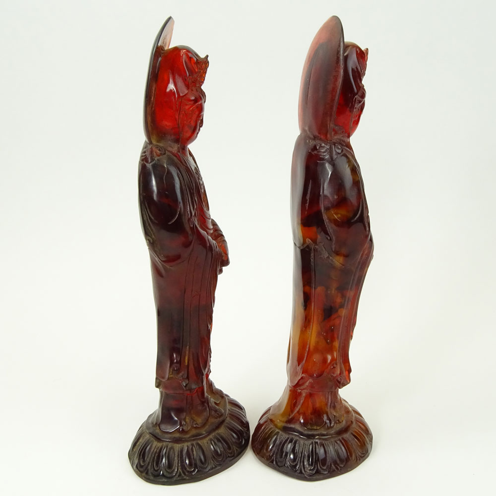 Pair of Vintage Carved Amber Deity Figurines.