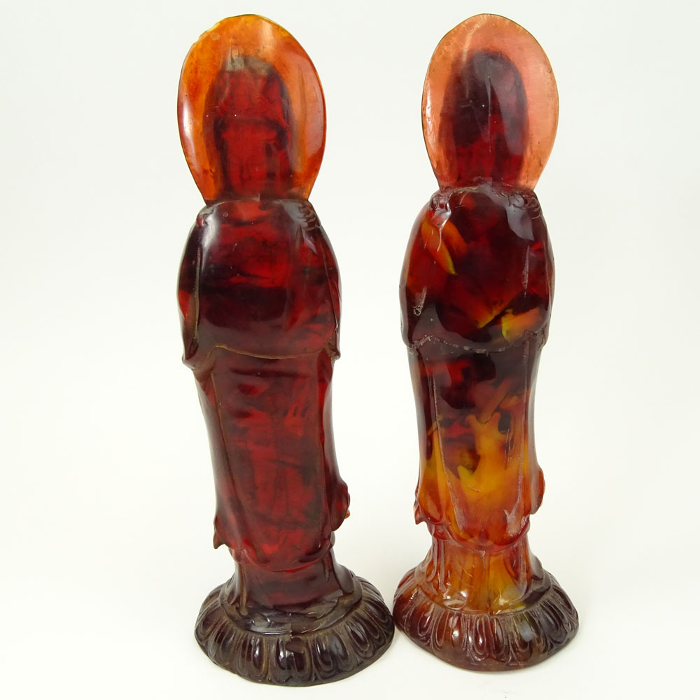 Pair of Vintage Carved Amber Deity Figurines.