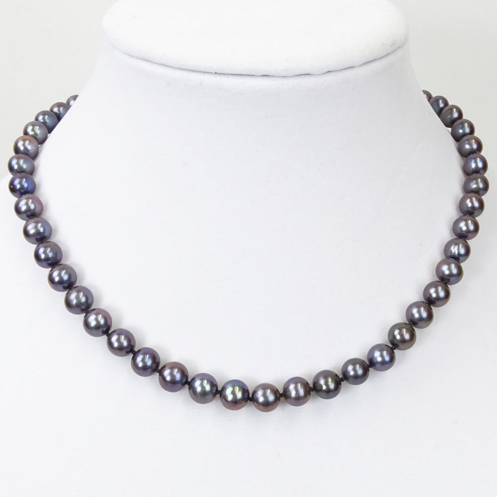 Lady's Black Pearl Necklace with Diamond and 14 Karat White Gold Clasp.