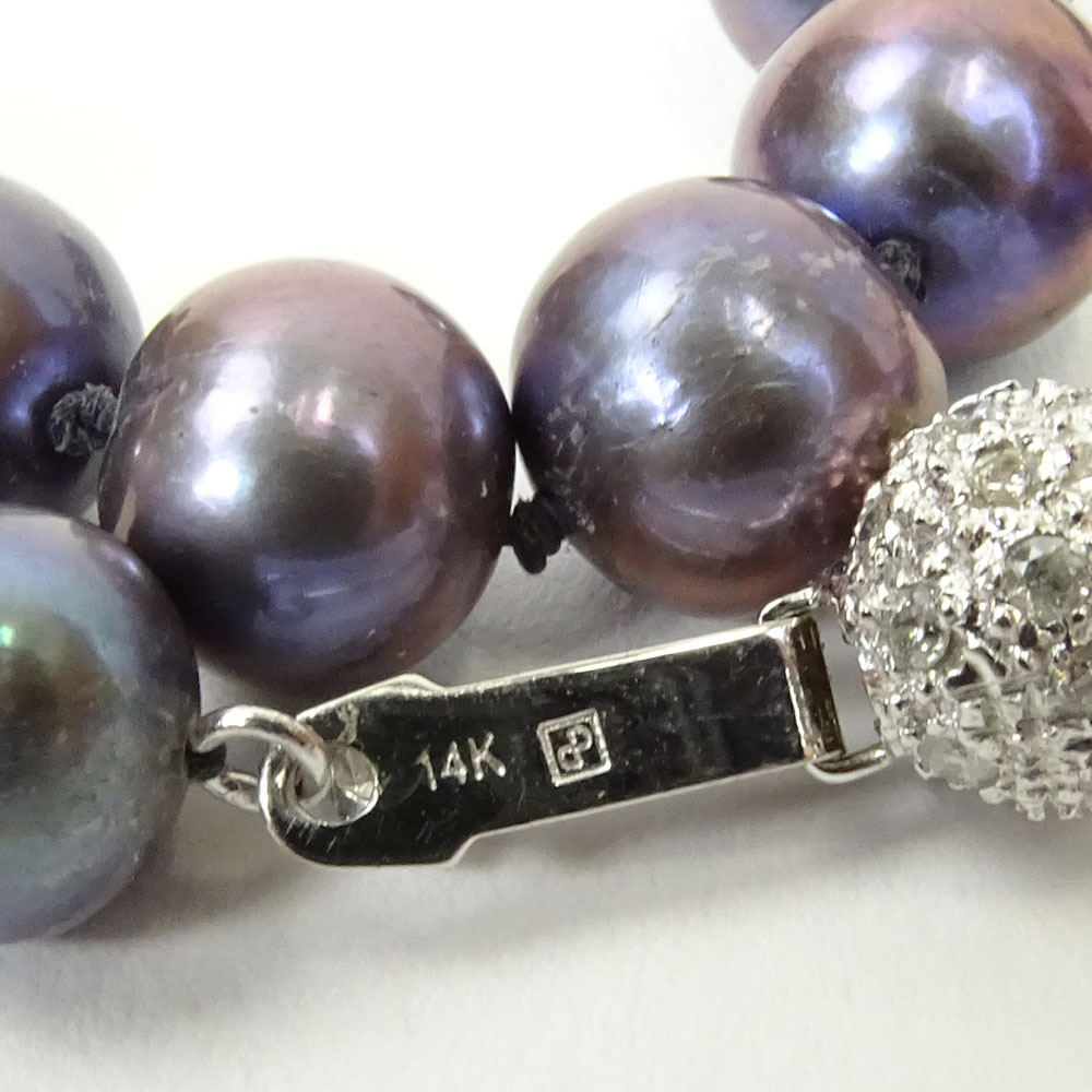 Lady's Black Pearl Necklace with Diamond and 14 Karat White Gold Clasp.