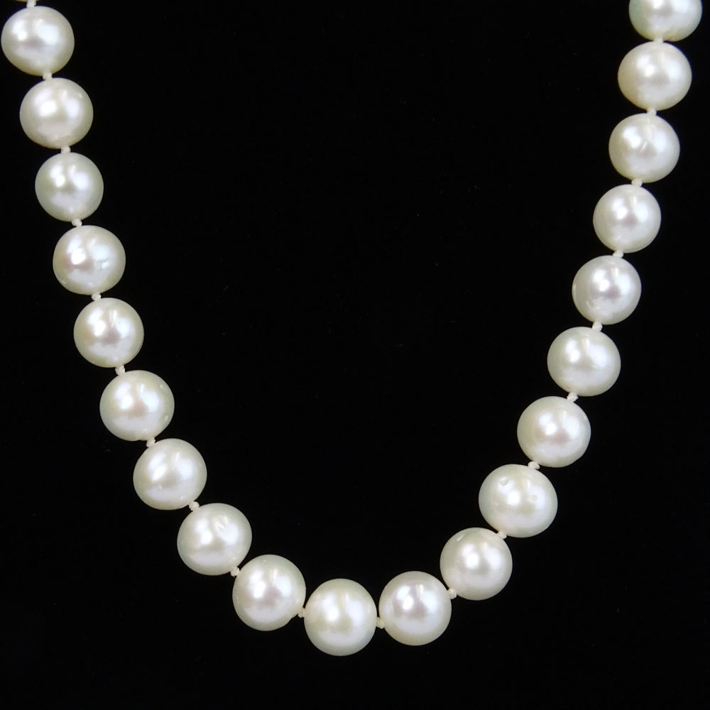 Lady's White Pearl Necklace with Diamond and 14 Karat White Gold Clasp.