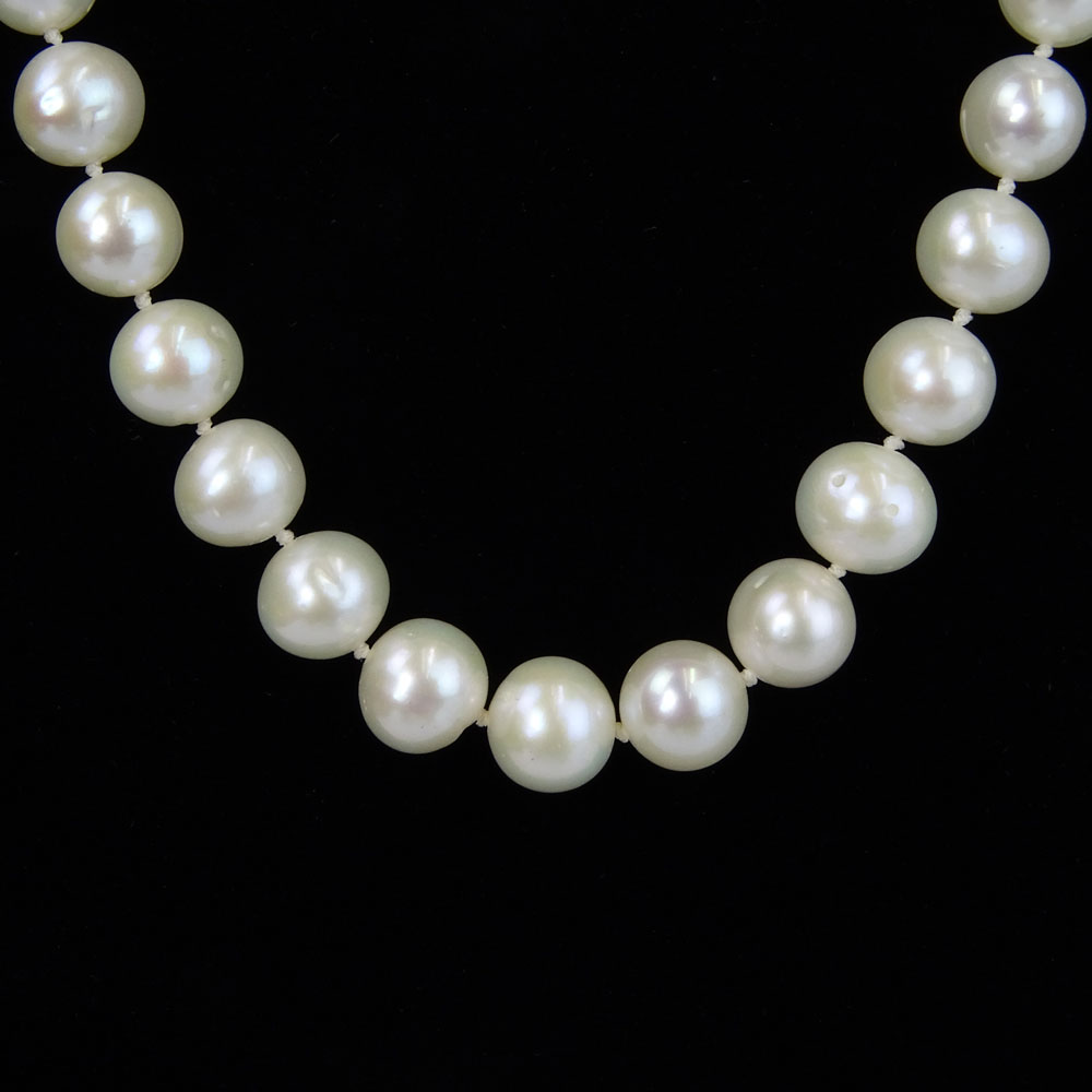 Lady's White Pearl Necklace with Diamond and 14 Karat White Gold Clasp.