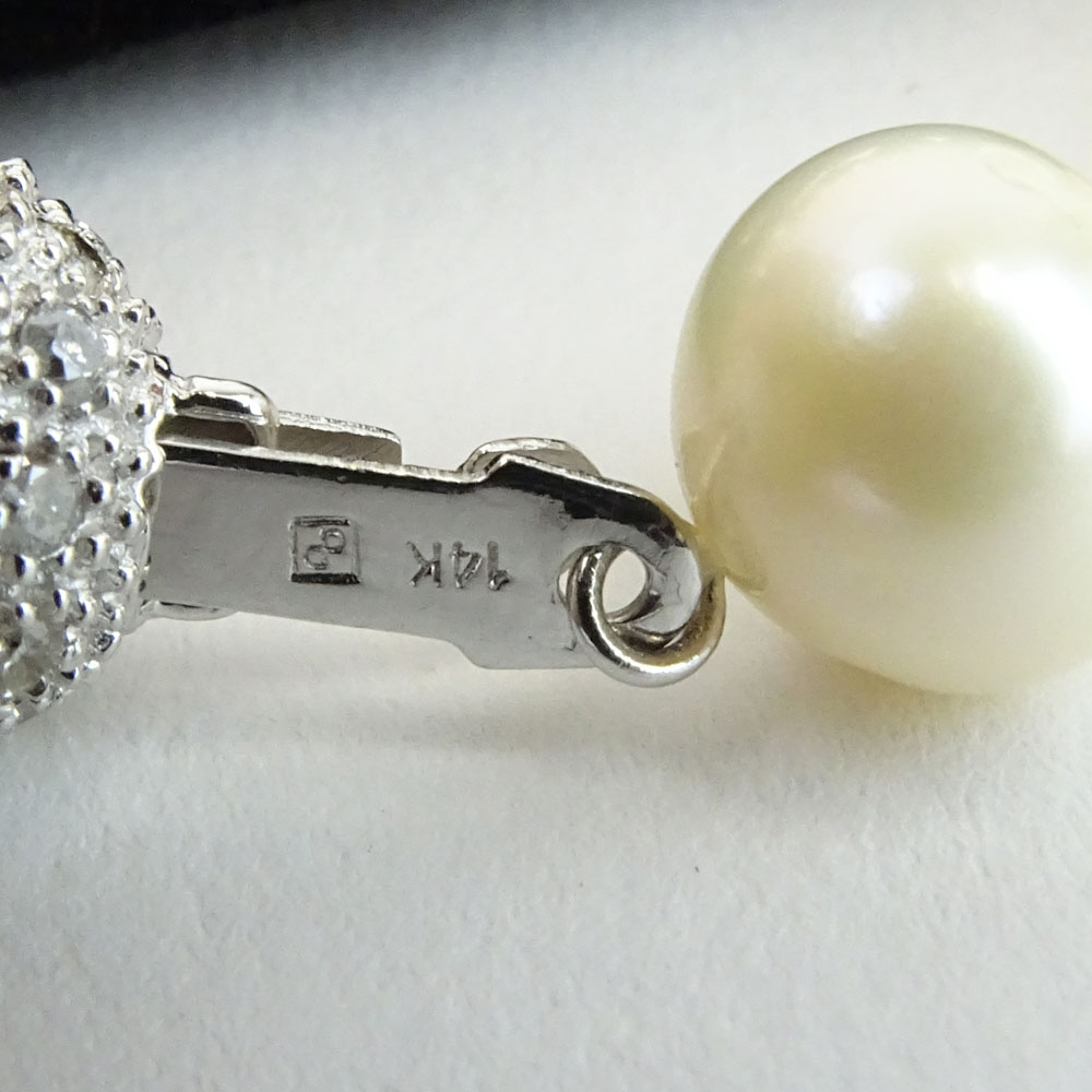 Lady's White Pearl Necklace with Diamond and 14 Karat White Gold Clasp.