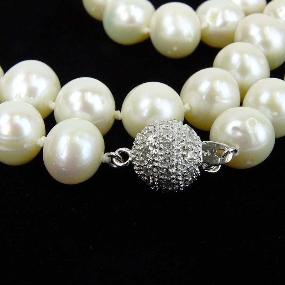 Lady's White Pearl Necklace with Diamond and 14 Karat White Gold Clasp.