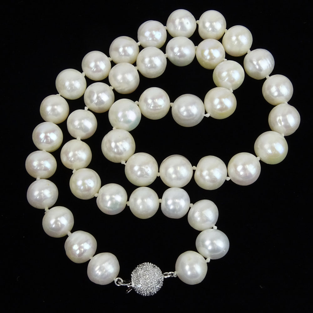 Lady's White Pearl Necklace with Diamond and 14 Karat White Gold Clasp.