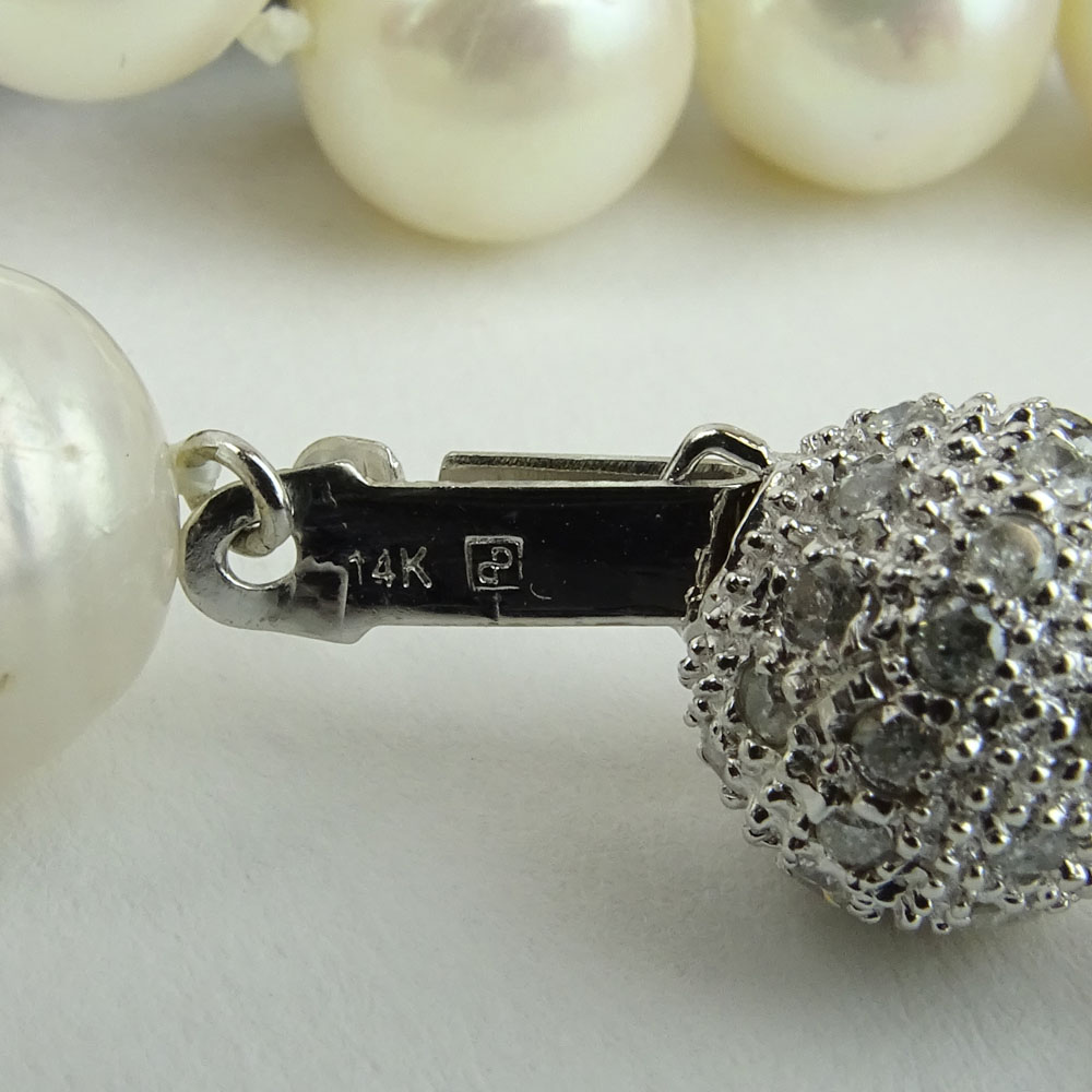 Lady's White Pearl Necklace with Diamond and 14 Karat White Gold Clasp.