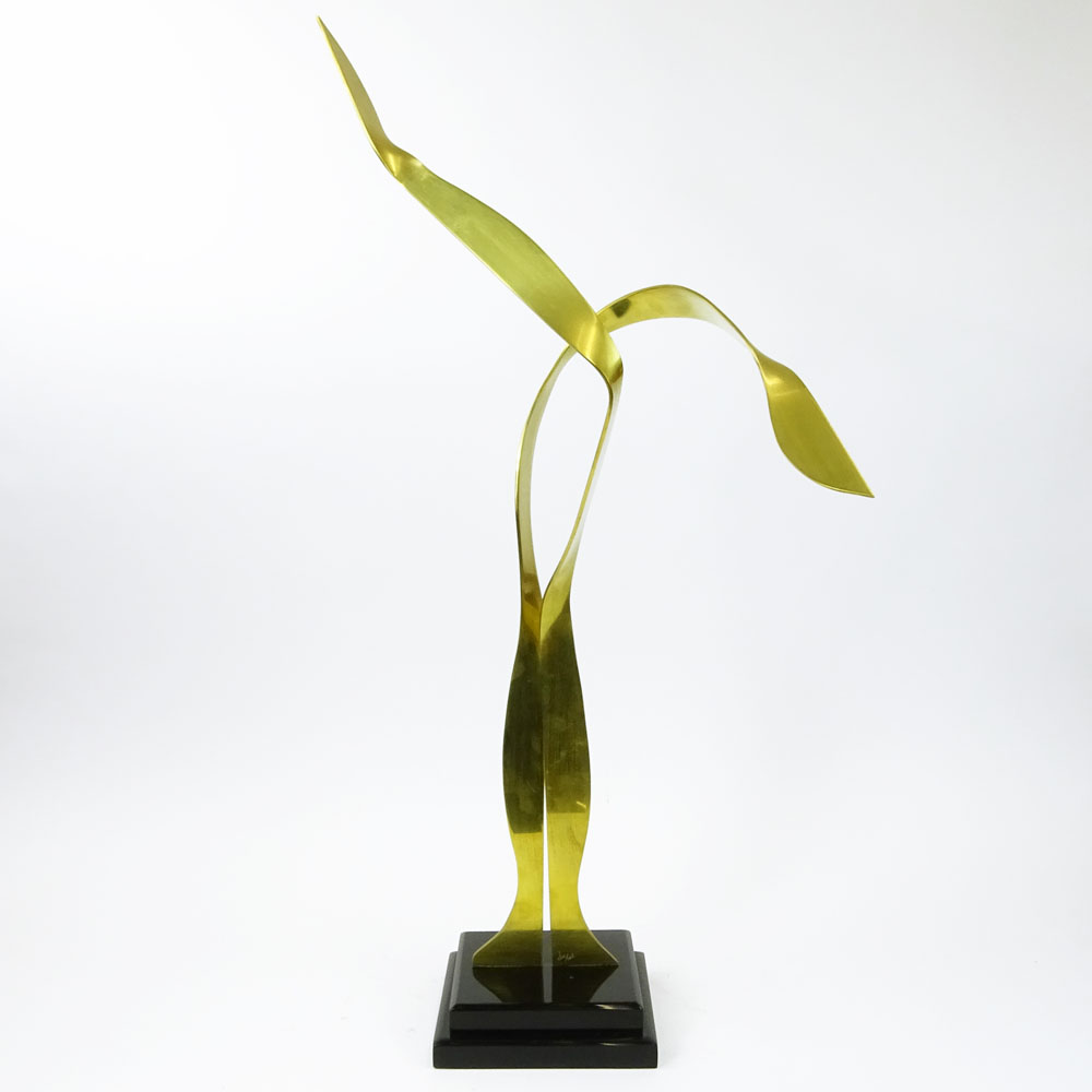 Mid-Century Modern Brass Abstract Sculpture on black Lucite base.