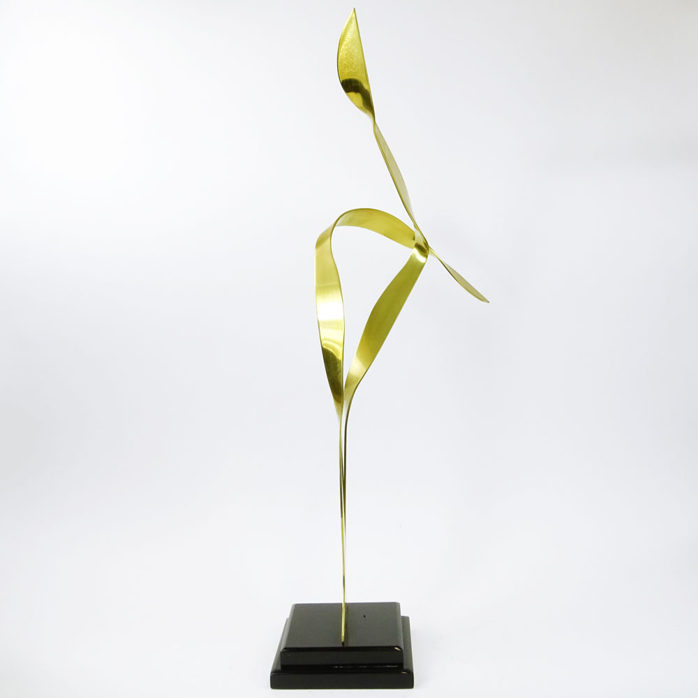 Mid-Century Modern Brass Abstract Sculpture on black Lucite base.