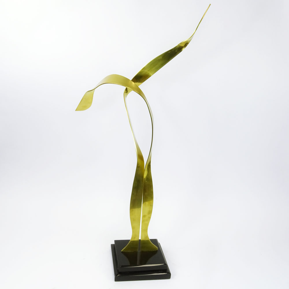 Mid-Century Modern Brass Abstract Sculpture on black Lucite base.