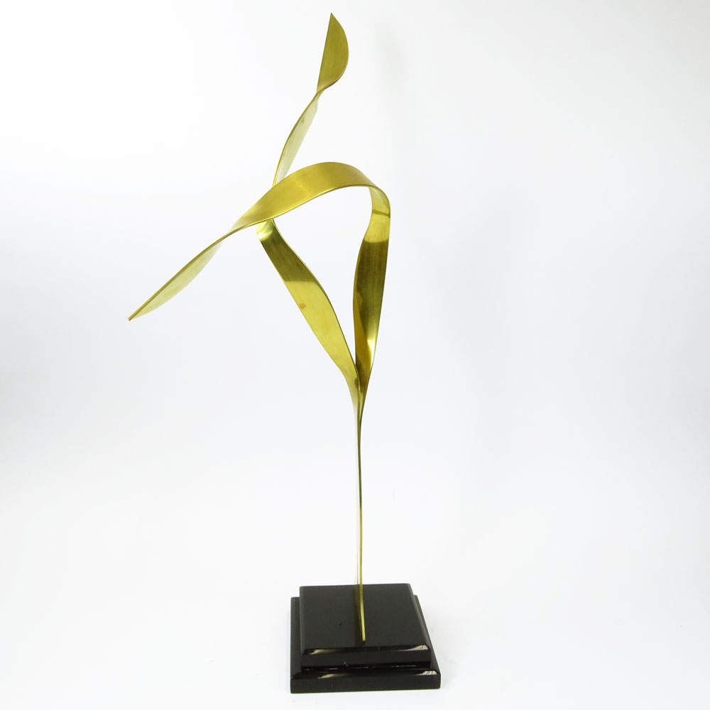 Mid-Century Modern Brass Abstract Sculpture on black Lucite base.