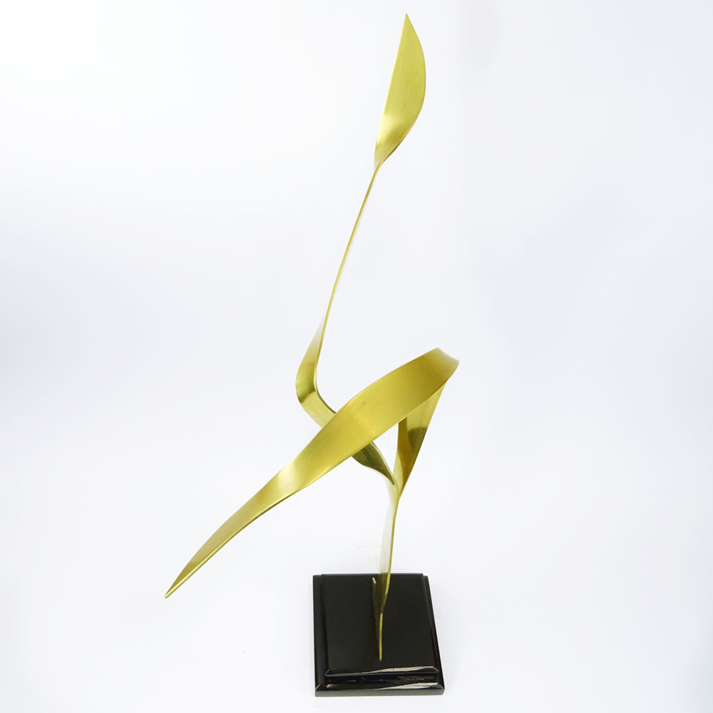 Mid-Century Modern Brass Abstract Sculpture on black Lucite base.