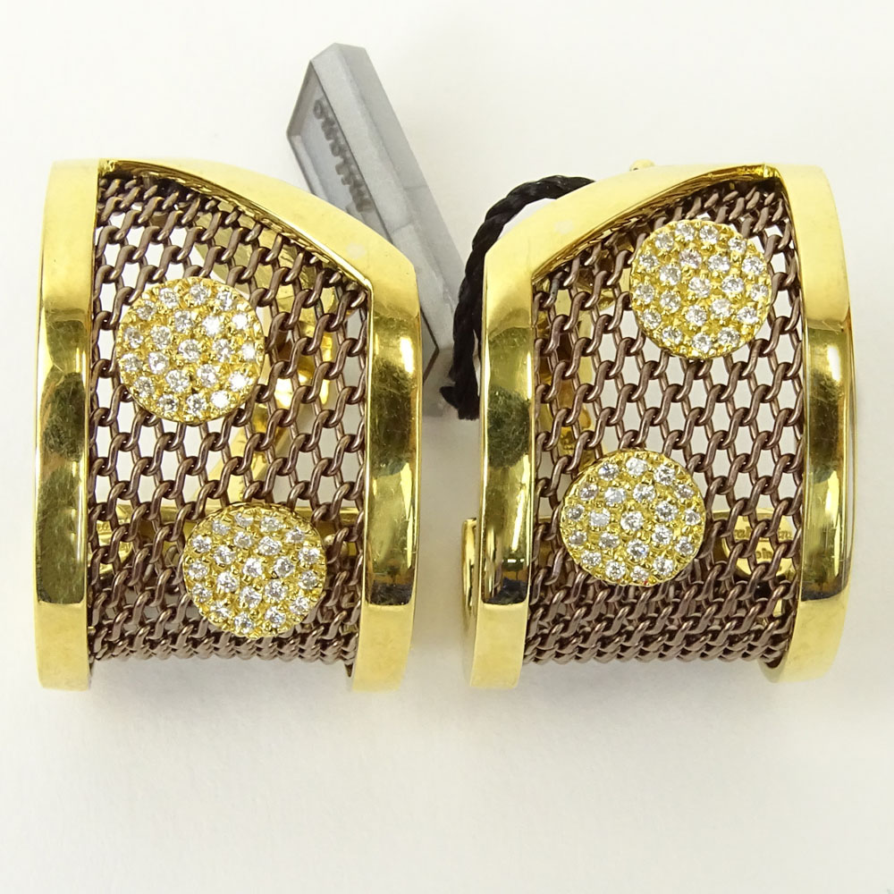 Pair of Lady's Italian Sabbadini 18 Karat Yellow Gold and Sterling Silver.