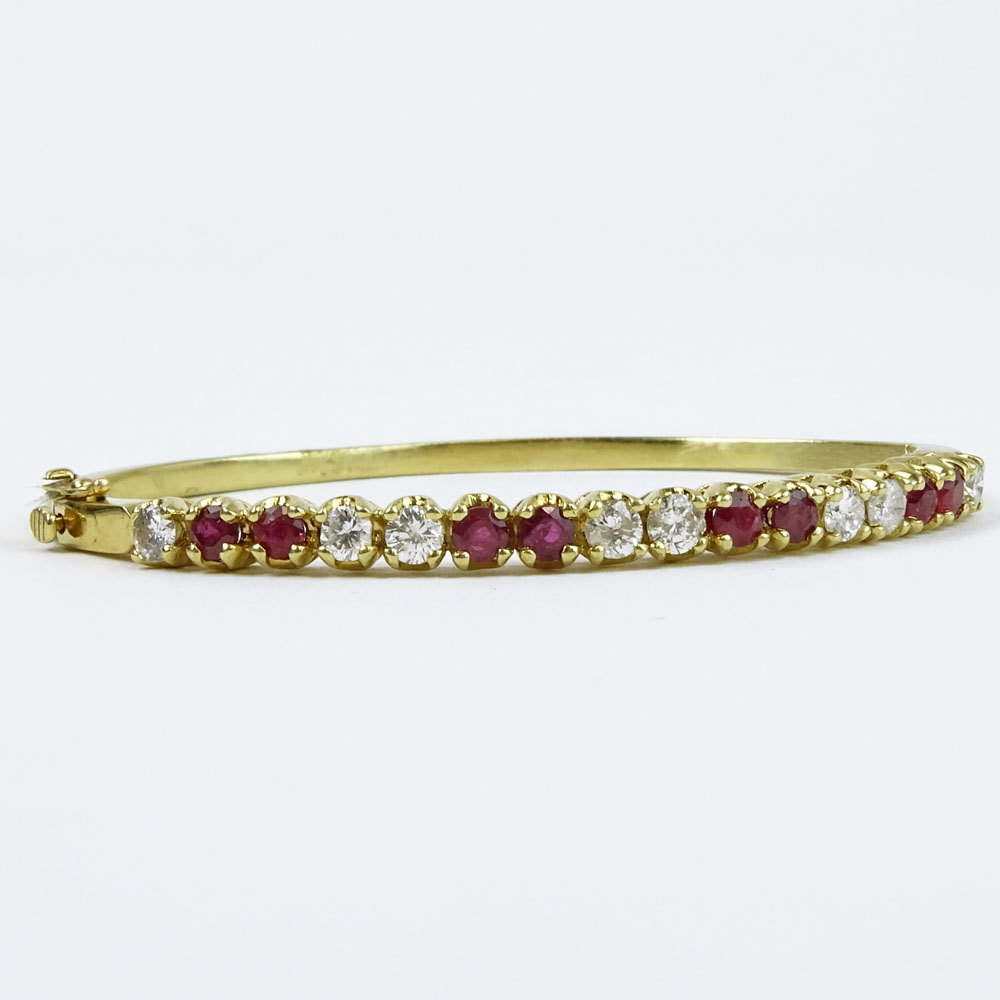 Lady's Vintage Approx. 1.70 Carat Diamond, 1.85 Carat Ruby and 14 Karat Yellow Gold Bangle Bracelet. 