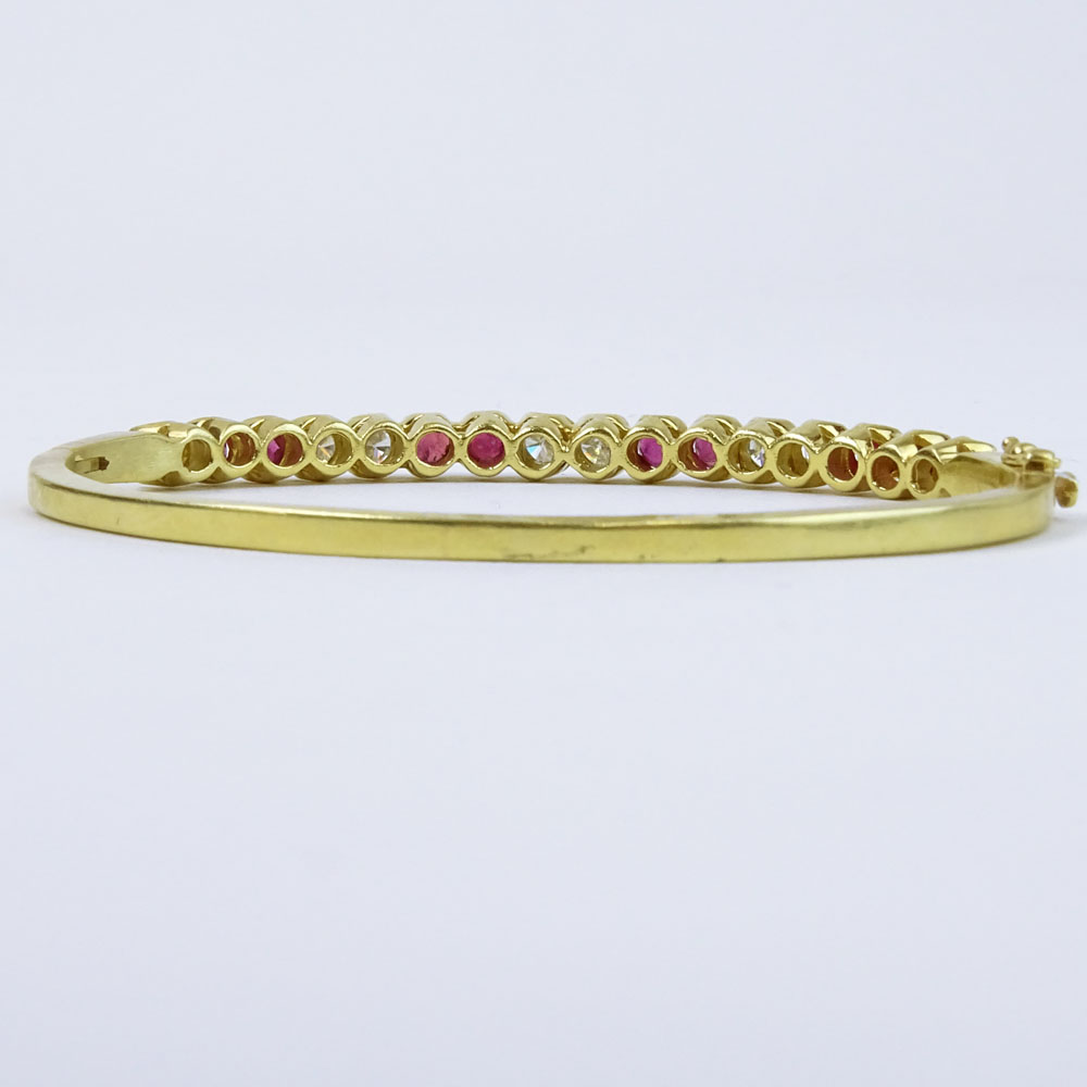 Lady's Vintage Approx. 1.70 Carat Diamond, 1.85 Carat Ruby and 14 Karat Yellow Gold Bangle Bracelet. 