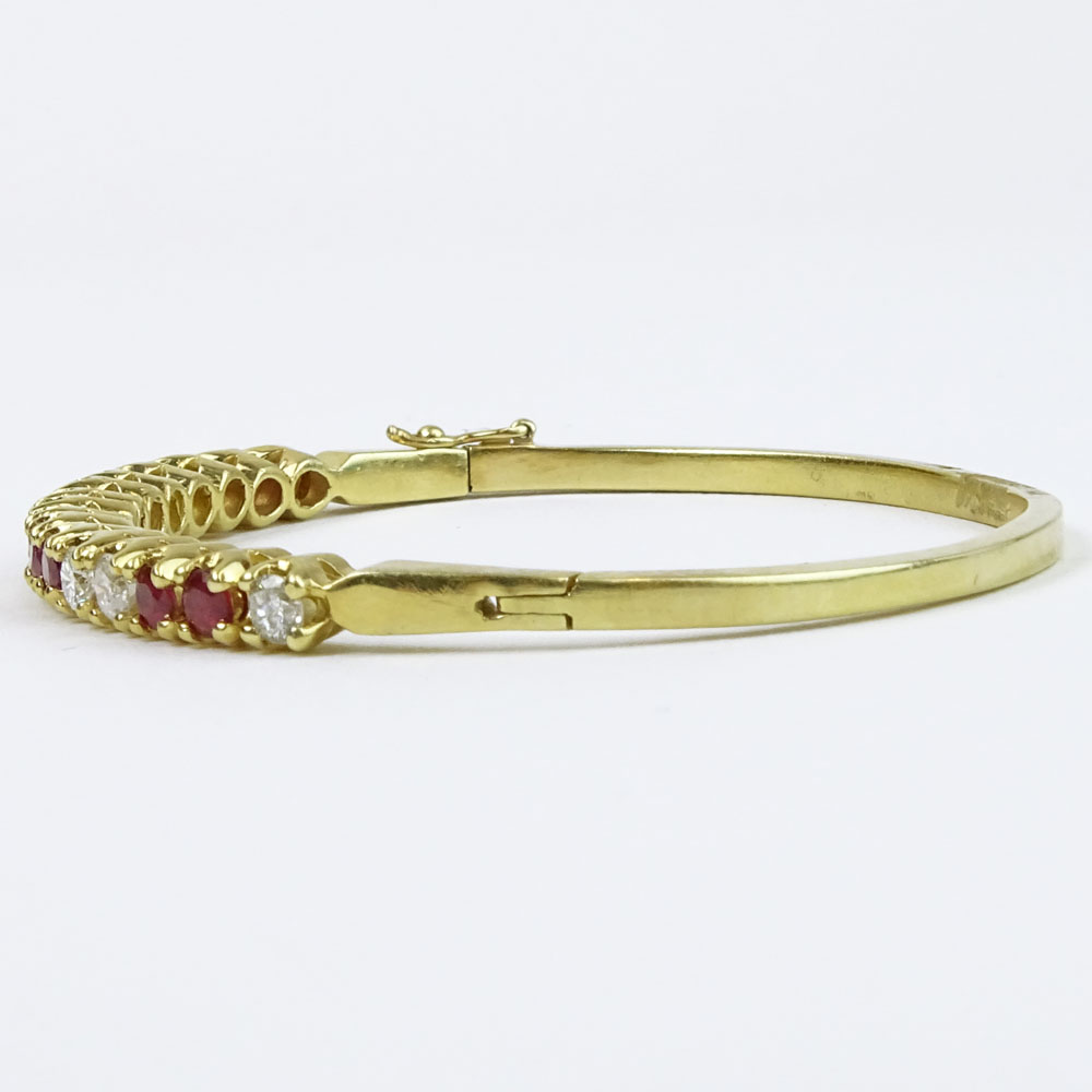 Lady's Vintage Approx. 1.70 Carat Diamond, 1.85 Carat Ruby and 14 Karat Yellow Gold Bangle Bracelet. 