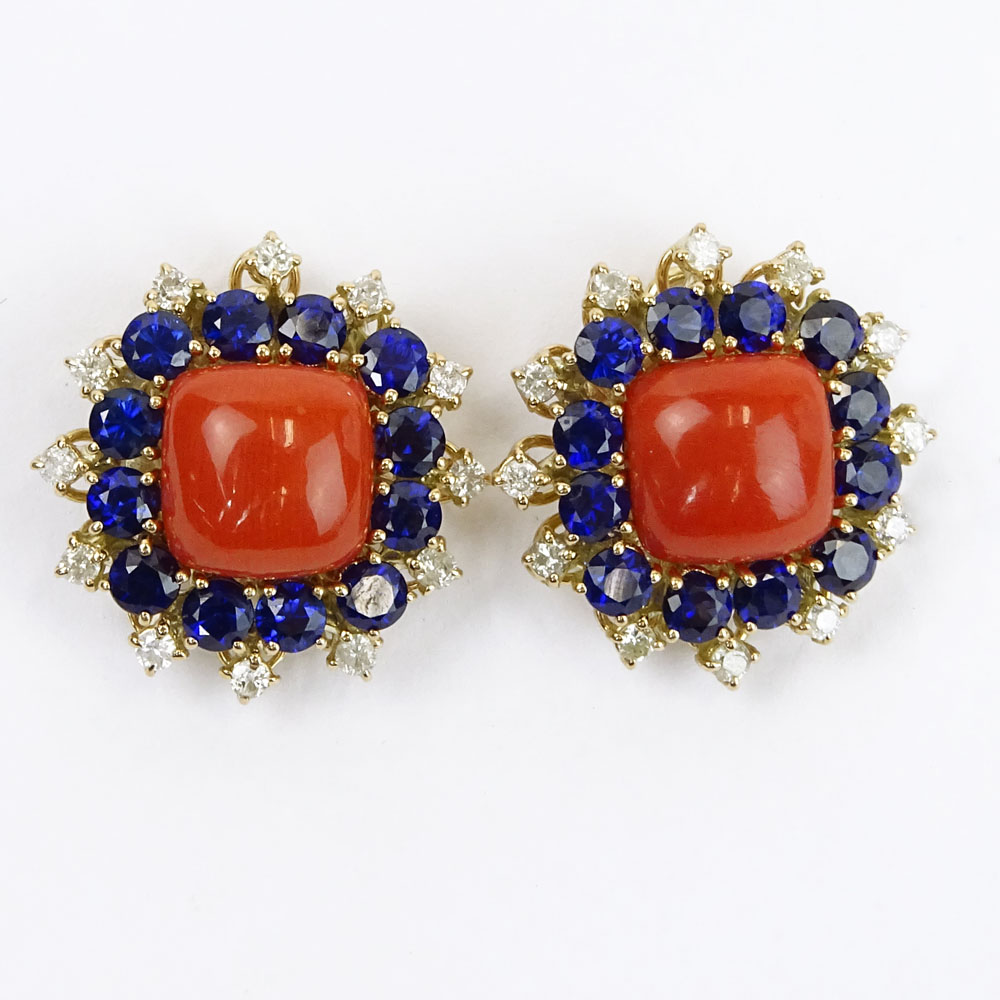 Pair of Coral, Round Cut Diamond, Sapphire and 14 Karat Yellow Gold Earrings. Sapphires with vivid saturation of color.