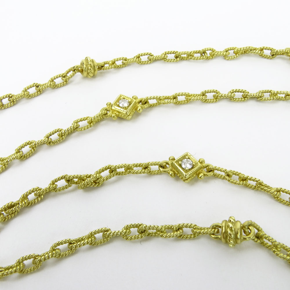 18 Karat Yellow Gold Necklace with Round Cut Diamond Accents.