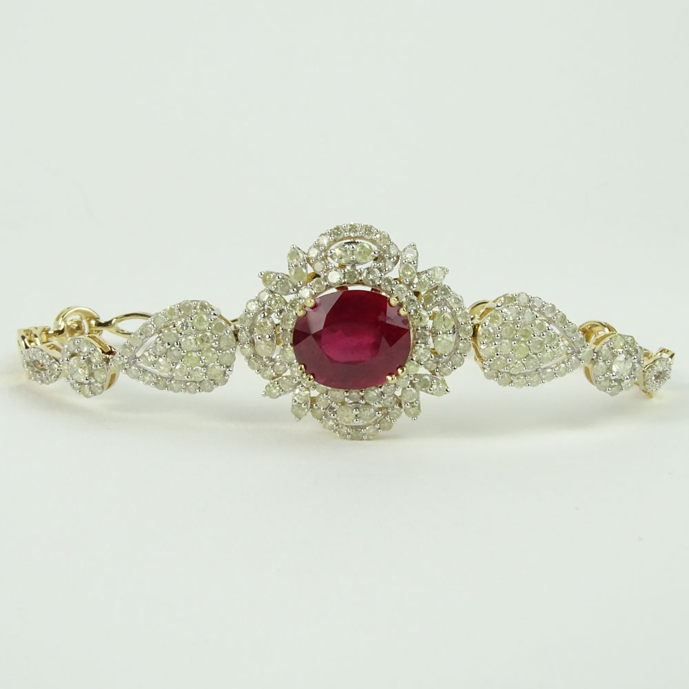 AIG Certified 6.77 Carat Oval Cut Ruby, 3.34 Carat Round Cut Diamond and 14 Karat Yellow Gold Bracelet. 