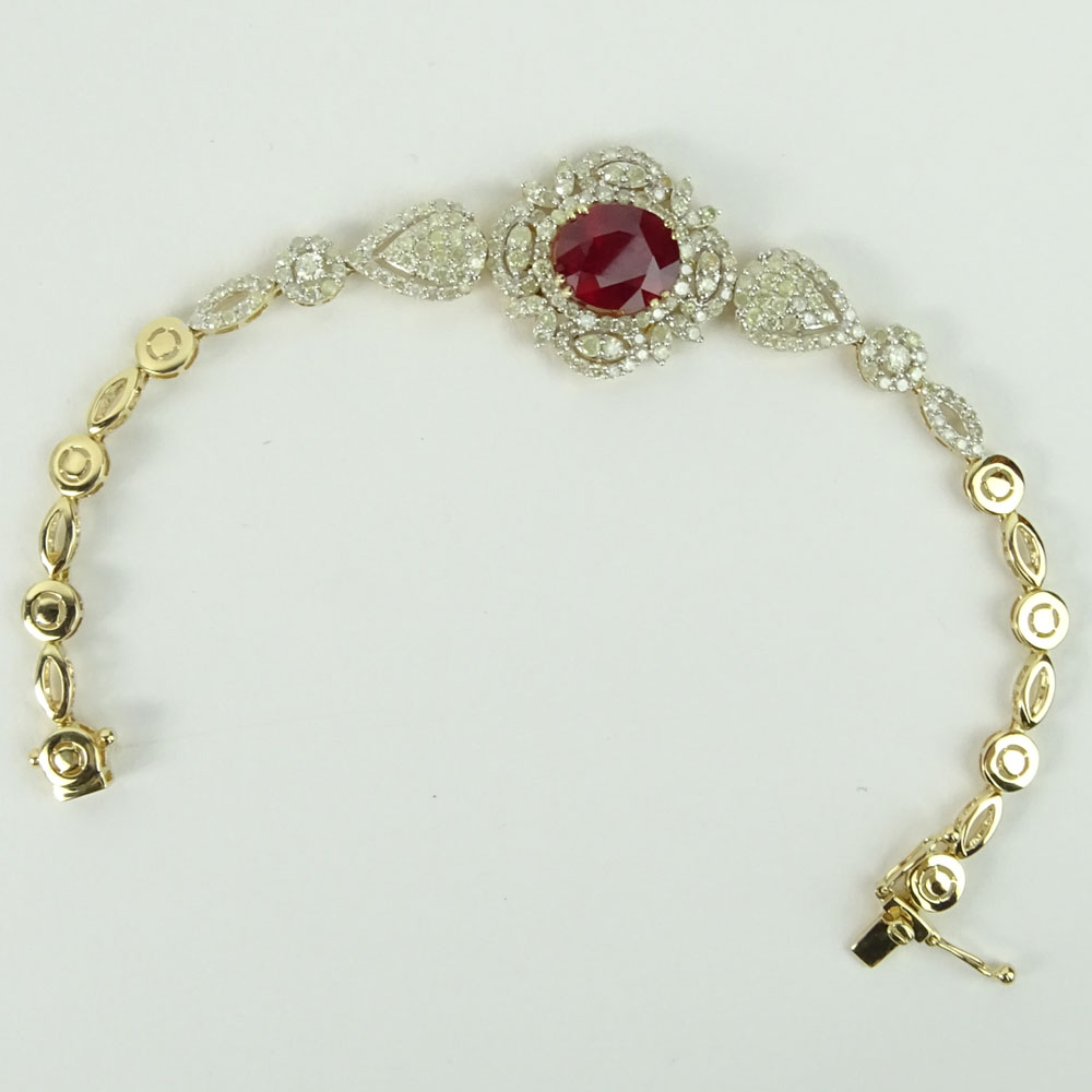 AIG Certified 6.77 Carat Oval Cut Ruby, 3.34 Carat Round Cut Diamond and 14 Karat Yellow Gold Bracelet. 