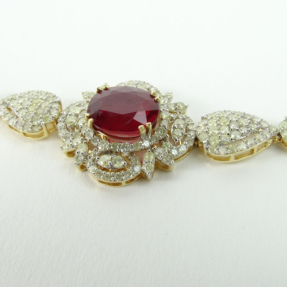 AIG Certified 6.77 Carat Oval Cut Ruby, 3.34 Carat Round Cut Diamond and 14 Karat Yellow Gold Bracelet. 