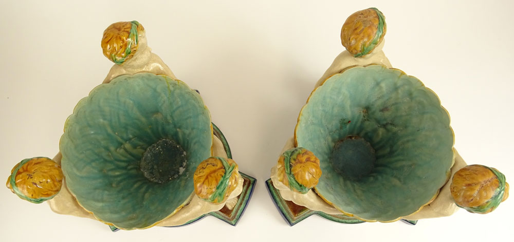 Pair Modern Figural Minton Style Majolica Planters. Each depicts three cherubs.