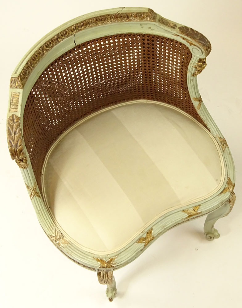 Early 20th Century French Louis XV style Painted and Parcel Gilt Wood Vanity Cane Back Chair.