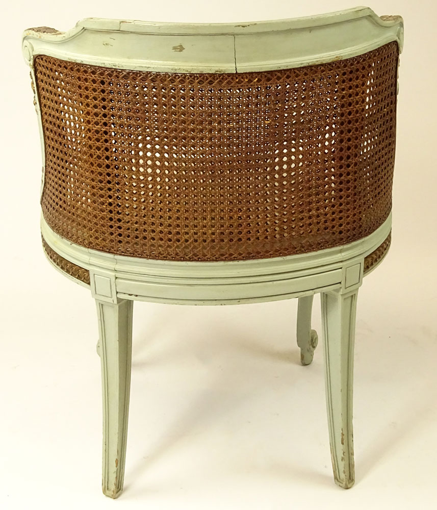 Early 20th Century French Louis XV style Painted and Parcel Gilt Wood Vanity Cane Back Chair.