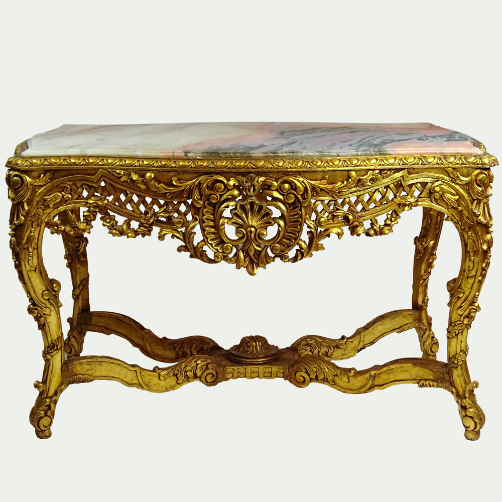 Large Rococo Style Carved and Giltwood Center Table with Marble top.