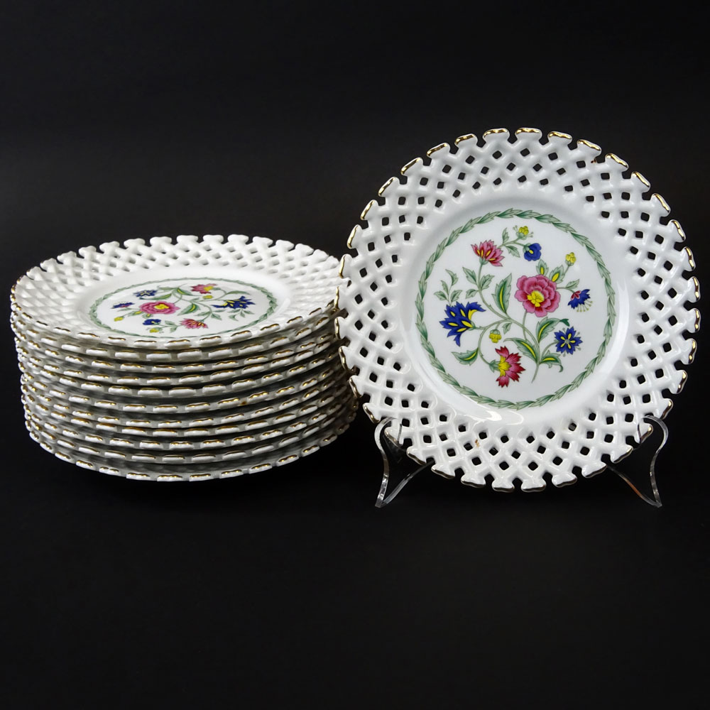 Set of 12 Reticulated Porcelain Dessert Plates.