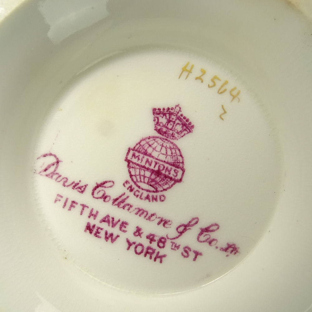 Lot of 9 Minton porcelain and gilt cream soup cups and saucers.