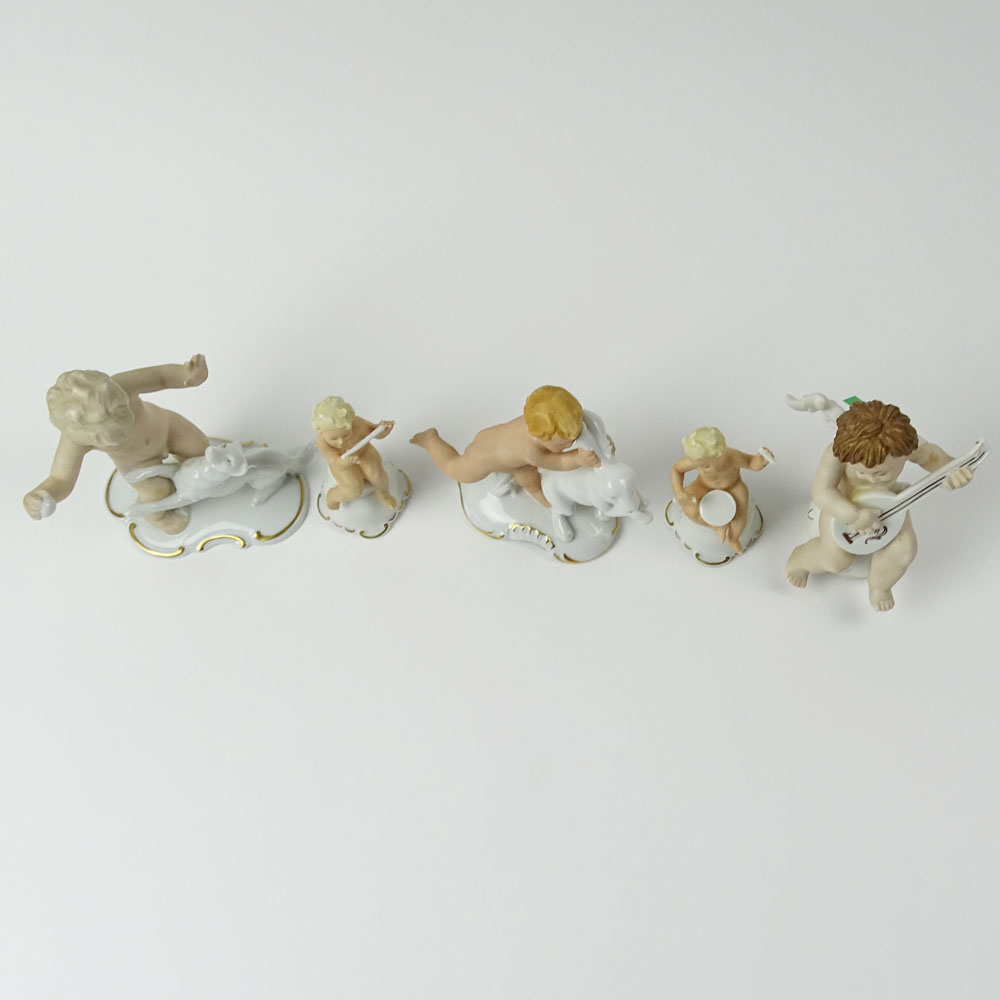 Lot of Five (5) Vintage German Porcelain Cherub Figurines.