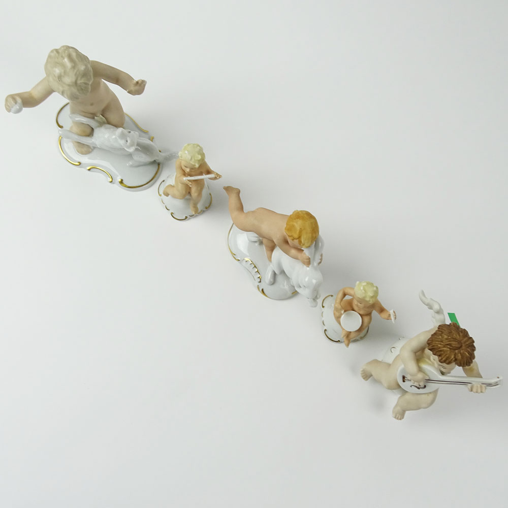 Lot of Five (5) Vintage German Porcelain Cherub Figurines.