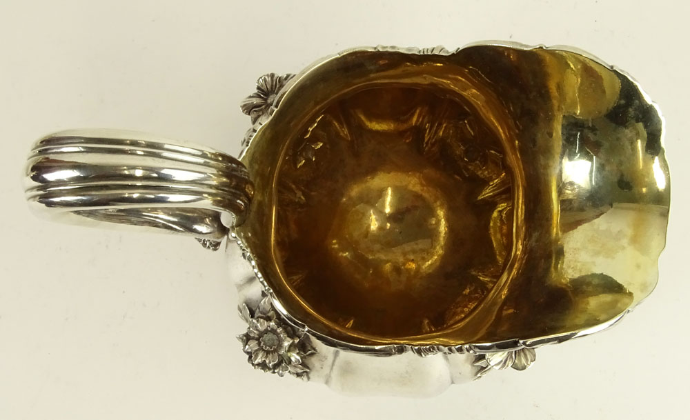 Early 19th Century German 875 Silver Footed Pitcher With Relief of Flowers.