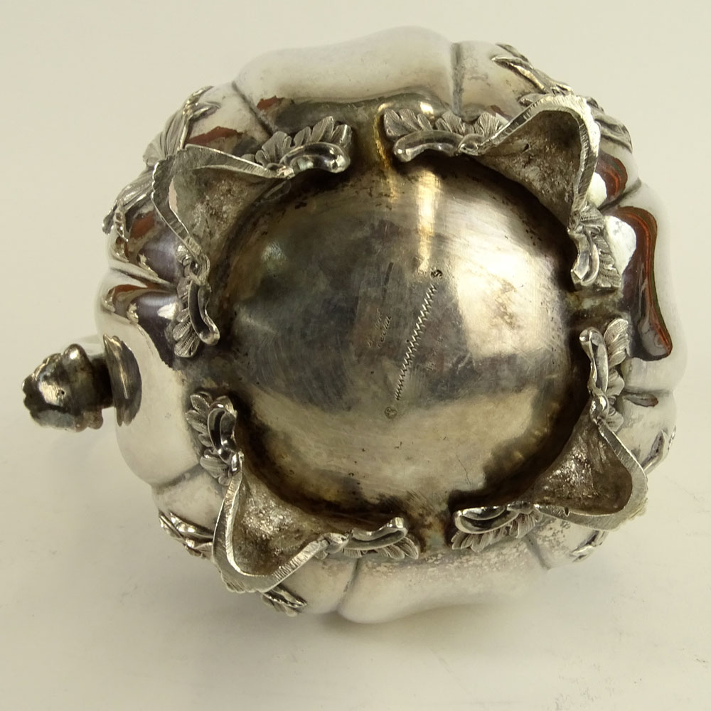Early 19th Century German 875 Silver Footed Pitcher With Relief of Flowers.