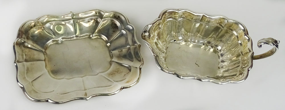 Vintage Reed & Barton Sterling Silver gravy/sauce boat and liner in the Windsor pattern.