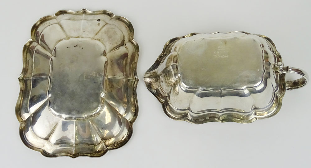 Vintage Reed & Barton Sterling Silver gravy/sauce boat and liner in the Windsor pattern.