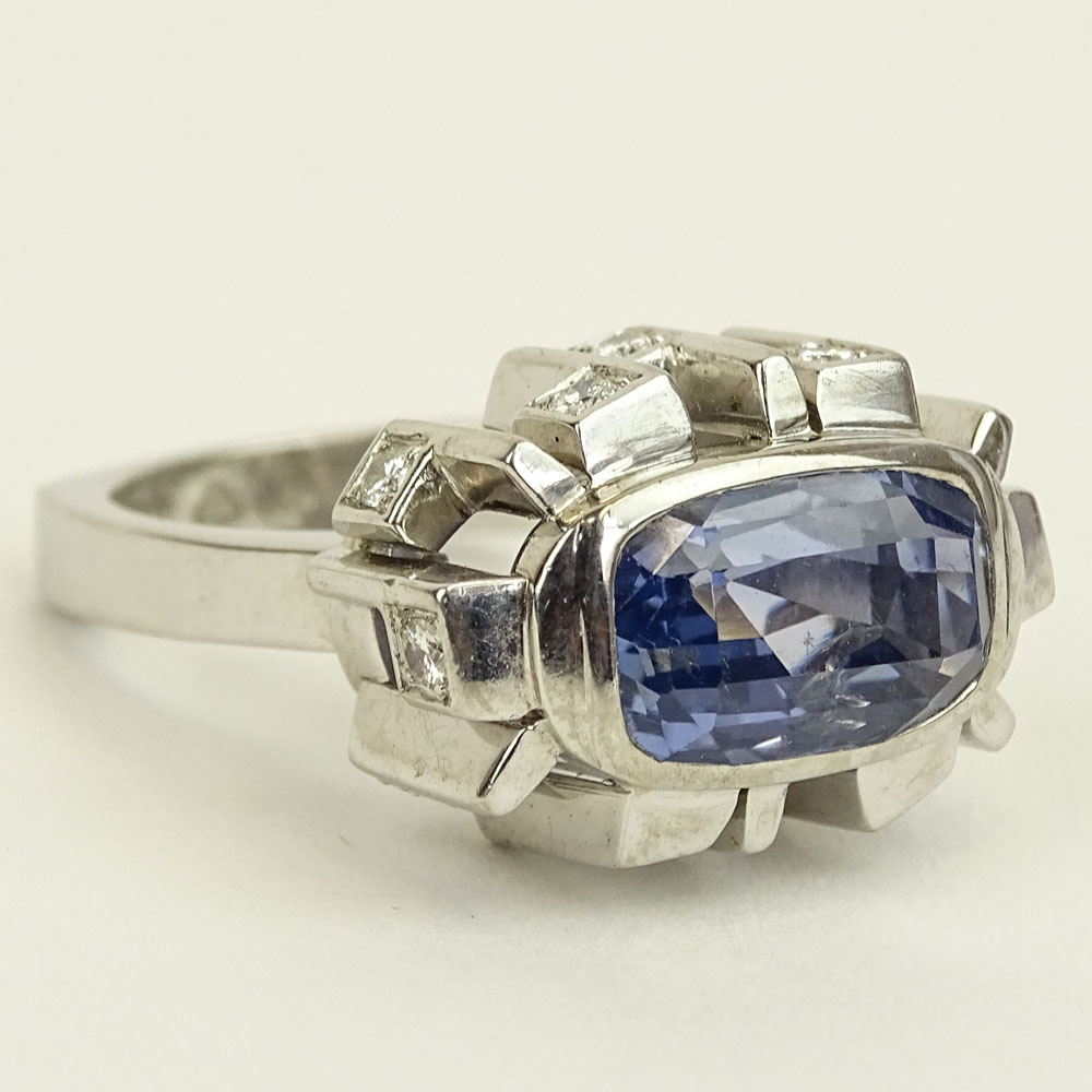 Approx. 8.65 Carat Natural Unheated Ceylon Sapphire and 18 Karat White Gold Ring accented with .60 Carat Round Cut Diamonds.