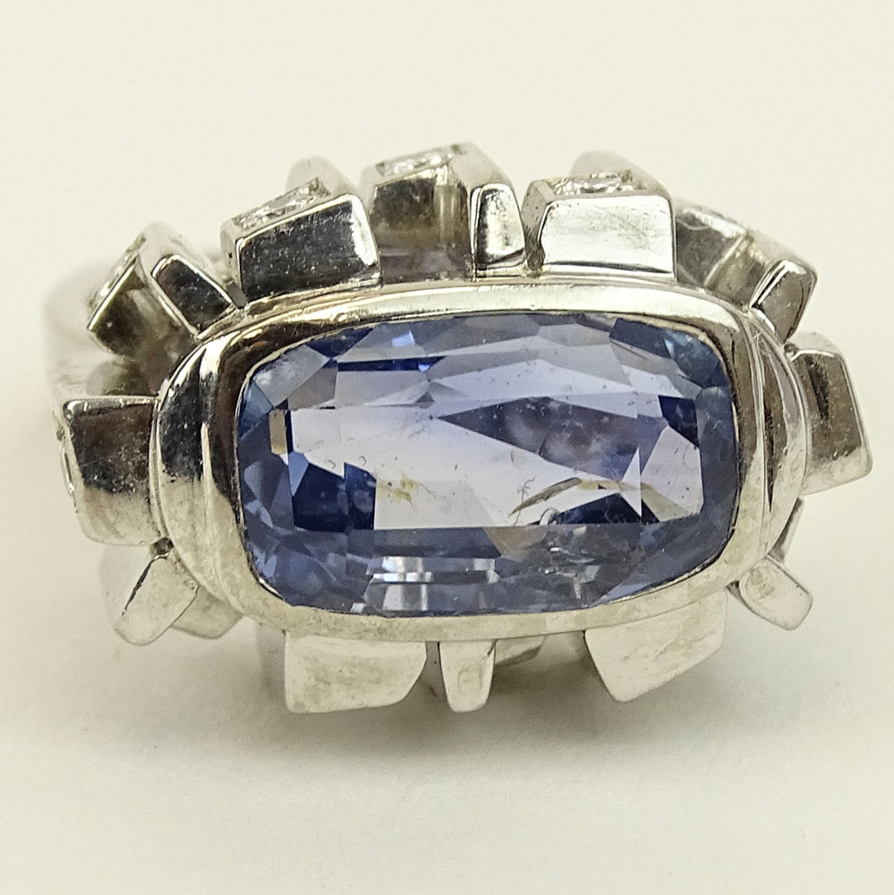 Approx. 8.65 Carat Natural Unheated Ceylon Sapphire and 18 Karat White Gold Ring accented with .60 Carat Round Cut Diamonds.