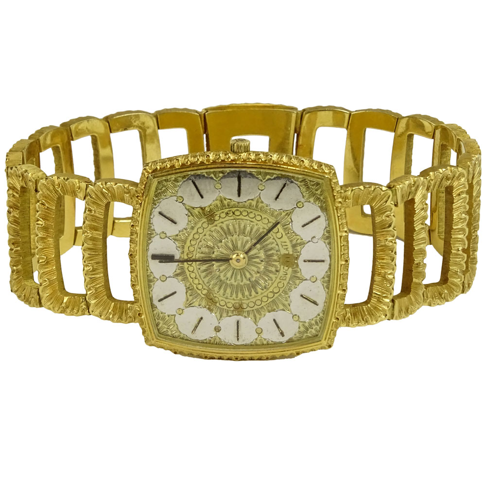 Vintage Buccelatti 18 Karat Yellow Gold Bracelet Watch with Universal Genève Manual Movement.