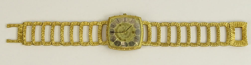 Vintage Buccelatti 18 Karat Yellow Gold Bracelet Watch with Universal Genève Manual Movement.