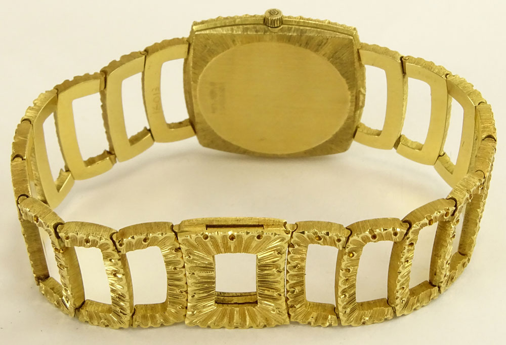 Vintage Buccelatti 18 Karat Yellow Gold Bracelet Watch with Universal Genève Manual Movement.