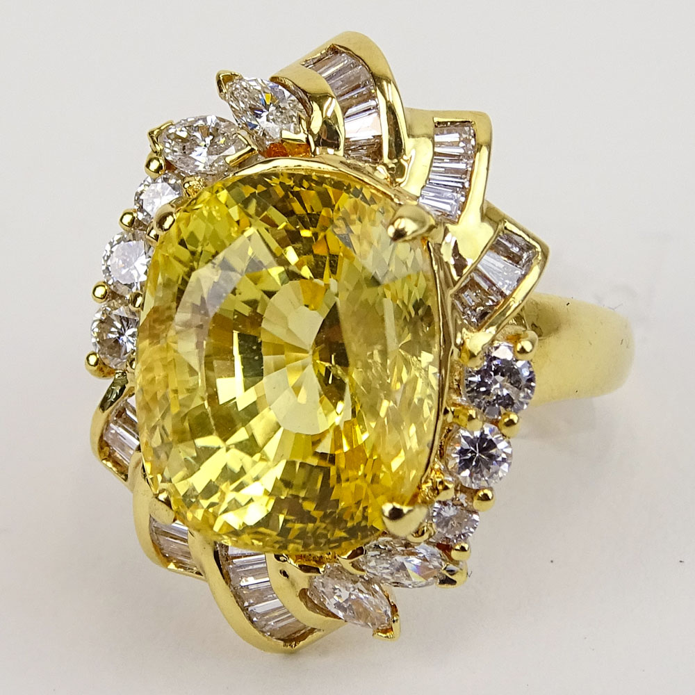 Approx. 14.07 Carat Oval Cut Sapphire, 1.05 Carat Diamond and 18 Karat Yellow Gold Ring.