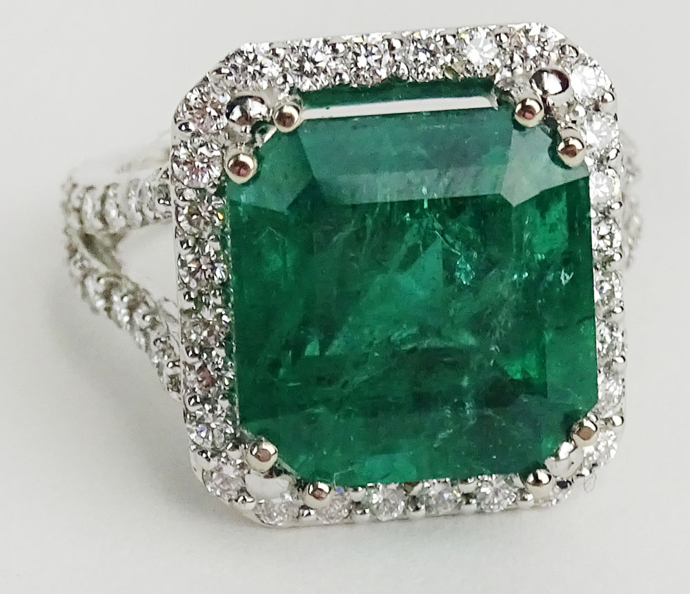 GIA Certified 9.71 Carat Octagonal Step Cut Emerald, approx. 1.21 Carat Round Cut Diamond and 18 Karat White Gold Ring. 