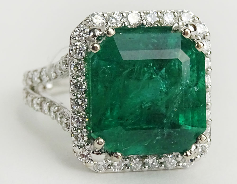 GIA Certified 9.71 Carat Octagonal Step Cut Emerald, approx. 1.21 Carat Round Cut Diamond and 18 Karat White Gold Ring. 