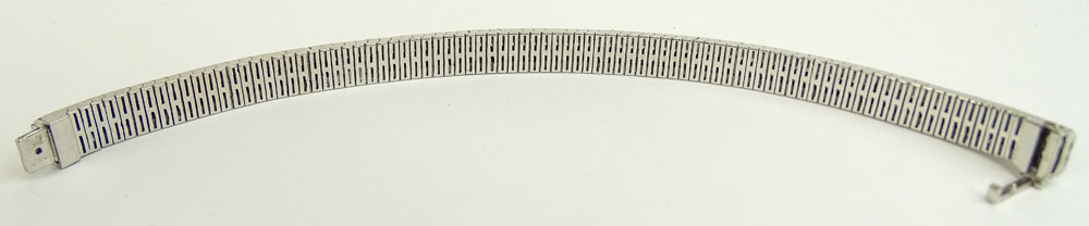 Lady's approx. 12.0 Carat Invisible Set Diamond and 18 Karat White Gold Flexible Link Bracelet.