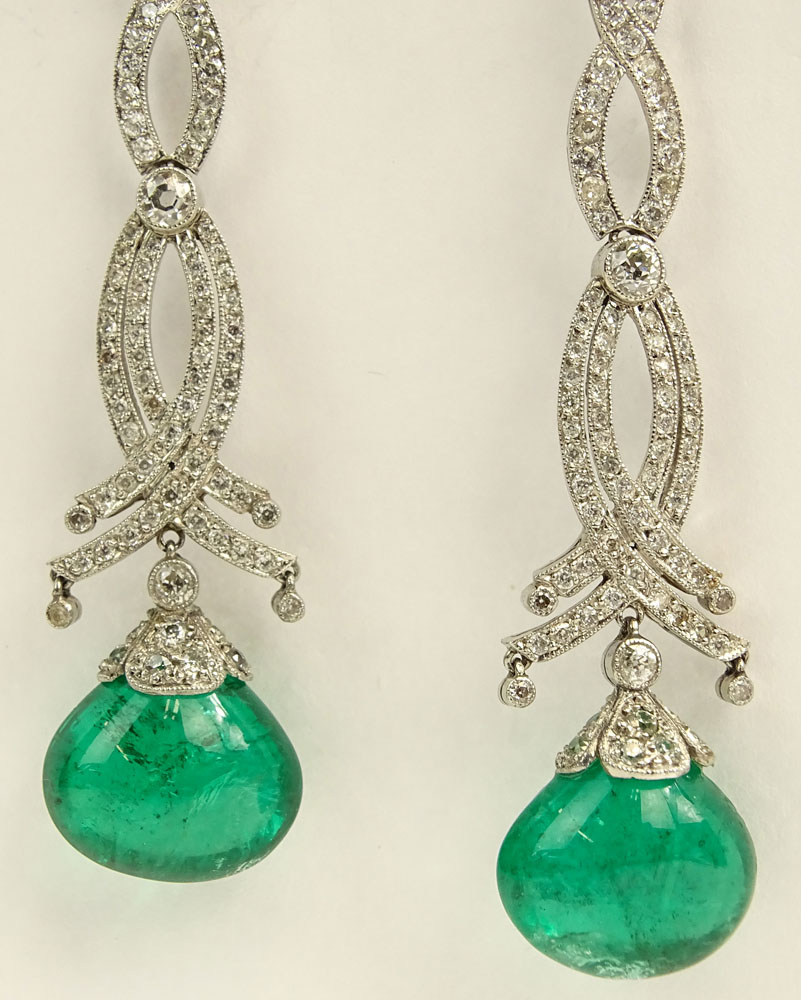 Beautiful Pair of approx. 25.0 Carat Colombian Emerald and Platinum Chandelier Earrings.