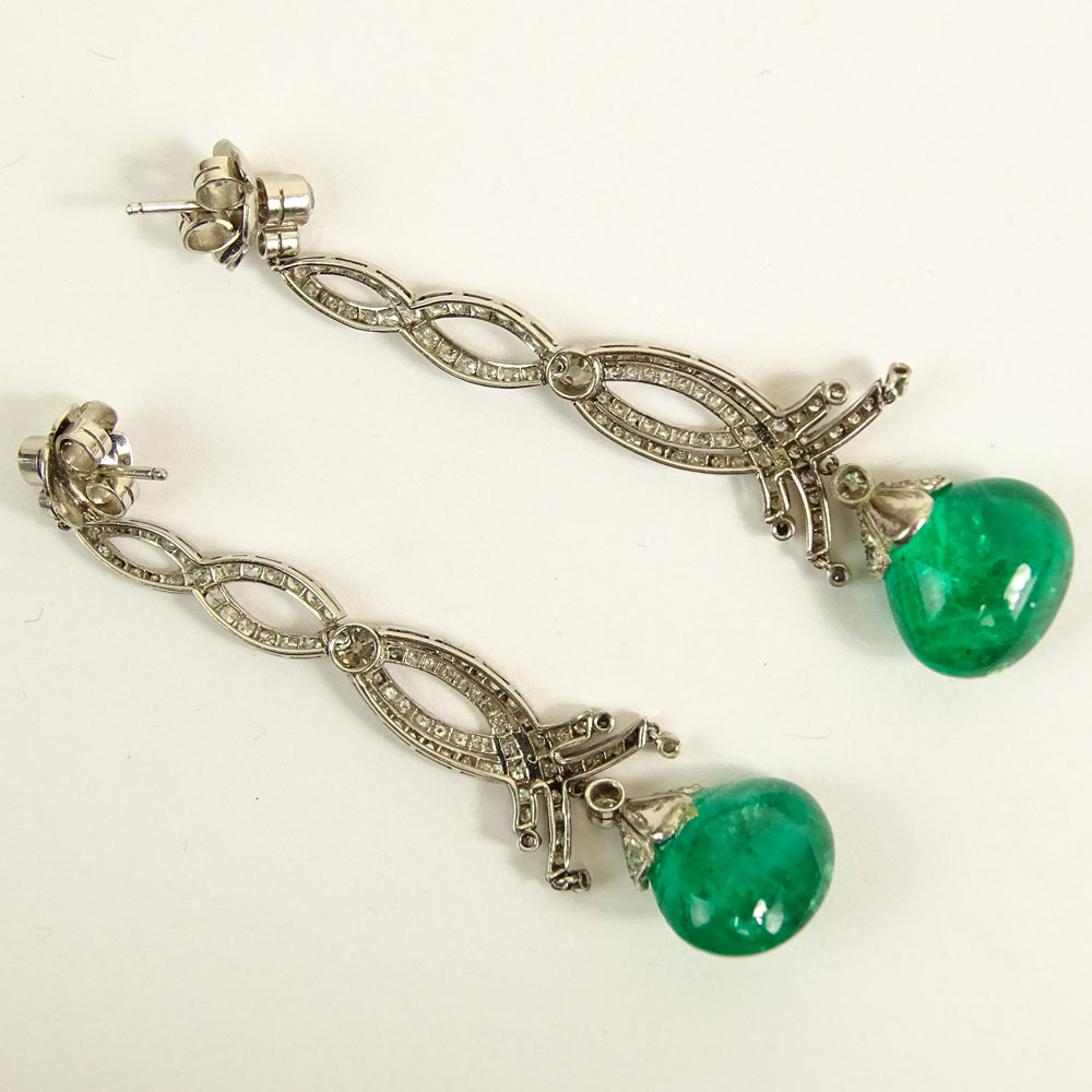 Beautiful Pair of approx. 25.0 Carat Colombian Emerald and Platinum Chandelier Earrings.