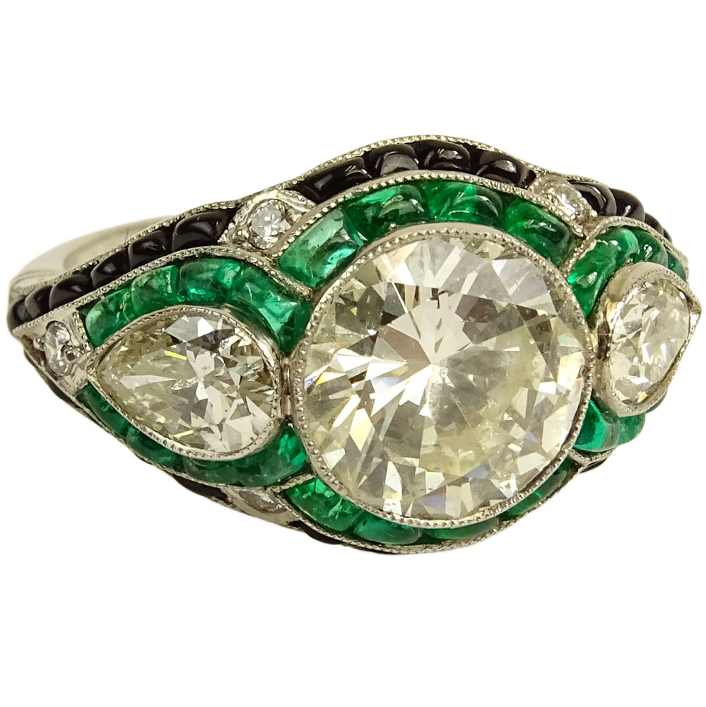 Very Fine Art Deco Design Approx. 4.25 Carat Cut Diamond, 1.50 Carat Colombian Emerald and Platinum Engagement Ring. 