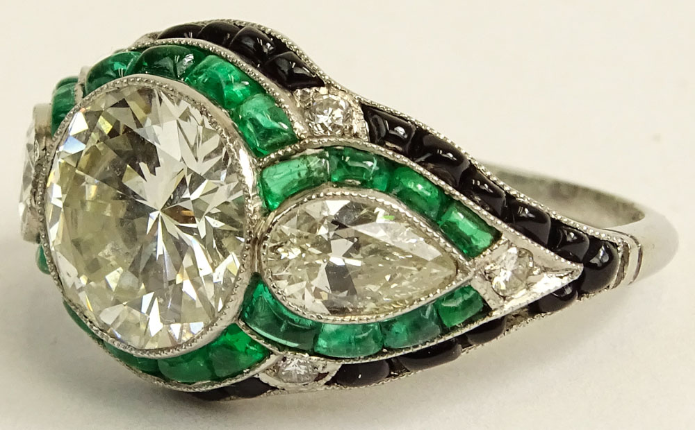 Very Fine Art Deco Design Approx. 4.25 Carat Cut Diamond, 1.50 Carat Colombian Emerald and Platinum Engagement Ring. 