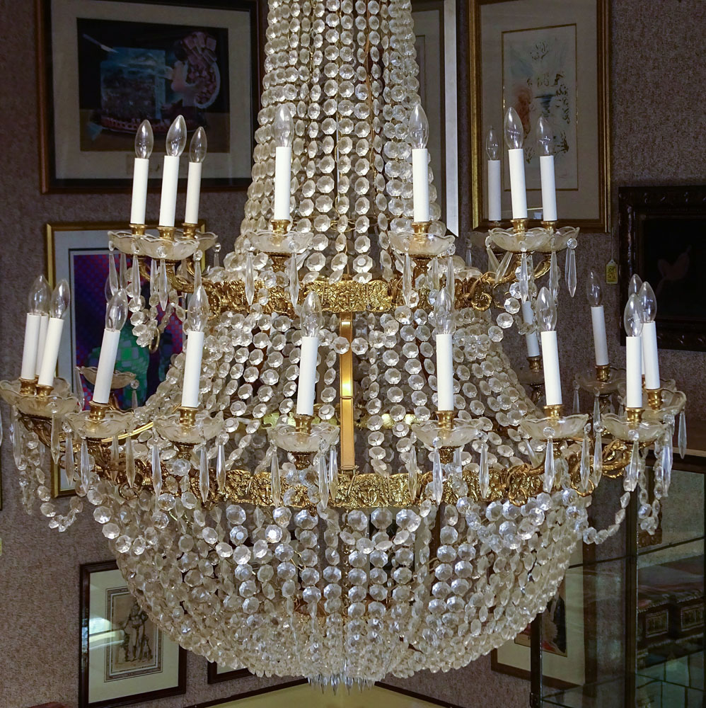 Contemporary Grand Scale Louis XVI style Bronze and Crystal Chandelier.